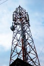 Cell radio phone tower standing under the nice sky Royalty Free Stock Photo