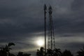 Cell SiteTower in Communacation the Golden Hour gray Sunset on a land Field