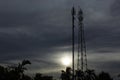 Cell SiteTower in Communacation the Golden Hour gray Sunset on a land Field Royalty Free Stock Photo