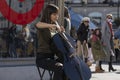 A cellist plays music in Puerta del Sol, Madrid, Spain Royalty Free Stock Photo