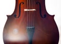 Cello closeup in dramatic light Royalty Free Stock Photo