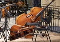 The cello lies on the stage next to the classical instruments during the intermission Royalty Free Stock Photo