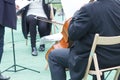 Cello player cellist in a free outdoor concert at a public park, musician plays cello Royalty Free Stock Photo