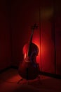 Cello, side view, against the wall. Generative AI Royalty Free Stock Photo