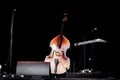 Cello violoncello in center of an empty stage at a concert Royalty Free Stock Photo