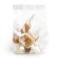 cellophane packet of wrapped caramel toffees. Royalty Free Stock Photo