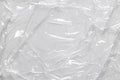 Cellophane plastic wrinkle clear surface with creases for macro light gray abstract wallpaper and background Royalty Free Stock Photo