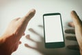 Cellphone and blur hands Royalty Free Stock Photo