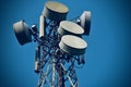 Cellphone tower with microwave dish stock photograph Royalty Free Stock Photo