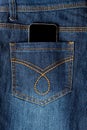Cellphone in jeans pocket Royalty Free Stock Photo