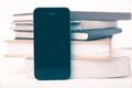 Cellphone with stack of book vintage style Royalty Free Stock Photo