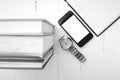 Cellphone with stack of book and watch black and white tone colo Royalty Free Stock Photo