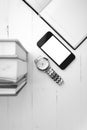 Cellphone with stack of book and watch black and white tone colo Royalty Free Stock Photo