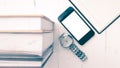 Cellphone with stack of book and watch vintage style Royalty Free Stock Photo