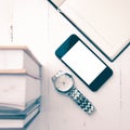 Cellphone with stack of book and watch vintage style Royalty Free Stock Photo