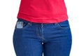 Cellphone sticking out of a jeans pocket Royalty Free Stock Photo