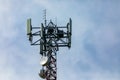 Cellular base station against cloudy sky Royalty Free Stock Photo