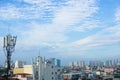 Cellular communications tower for mobile phone and video data transmission in resident area Royalty Free Stock Photo