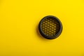 a cellular flash attachment on a yellow background.photo equipment. Royalty Free Stock Photo