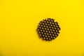 a cellular flash attachment on a yellow background.photo equipment. Royalty Free Stock Photo
