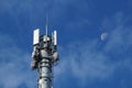 Cellular 5G network technology mobile telecommunications tower with mounted equipment - antennas, cables, electronic Royalty Free Stock Photo