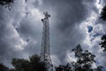 Cellular mobile communications tower, against the background of the night sky Royalty Free Stock Photo