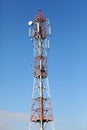 Cellular, mobile phone transmitter tower and weather station Royalty Free Stock Photo