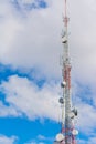 Cellular phone antenna under clouds Royalty Free Stock Photo