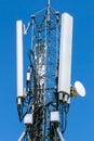 Cellular phone network telecommunication tower with mounted antenanas Royalty Free Stock Photo