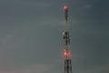 Cellular signal transmitter tower at night Royalty Free Stock Photo