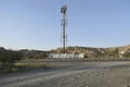 Cellular telecom tower in a remote area of a desert