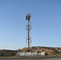 Cellular telecom tower in a remote area of a desert