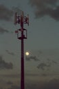 Cellular tower and Sunset. Equipment for relaying cellular and mobile signal.