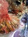 Decoratively wrapped cookies and cakes in store refridgerated unit