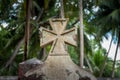 Celtic cross grave stone in foreground