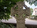 Celtic cross on gravestone outside Parish Church, Holsworthy, Devon, UK.