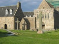 Celtic Cross and Iona Abbey Royalty Free Stock Photo