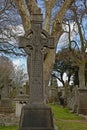 Celtic cross with knot decoration embossed in stone