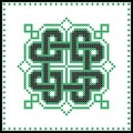 Celtic knot in black and green cross stitch pattern on white and black background inspired by Irish St Patrick`s day