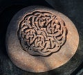 Celtic Knot Stone Carving on Circular Rock