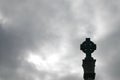 Celtic Stone Cross against grey sky