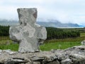 Celtic Stone Cross on top of stone wall Royalty Free Stock Photo