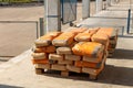 Cement bags are placed on pallets and stored in warehouses Royalty Free Stock Photo