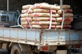 Cement bags transportation Royalty Free Stock Photo