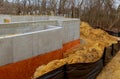 The cement basement foundation of a new housing development