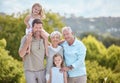 The cement that binds closer together. a family standing together in a park. Royalty Free Stock Photo