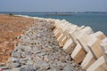 Cement block breakwaters of coastal roads, highway seawalls Royalty Free Stock Photo
