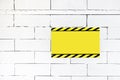 Cement block wall with blank warning poster,template to fill you Royalty Free Stock Photo