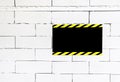 Cement block wall with blank warning poster,template to fill you Royalty Free Stock Photo