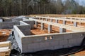 Cement blocks laid a wall for foundation of house on construction site. Royalty Free Stock Photo
